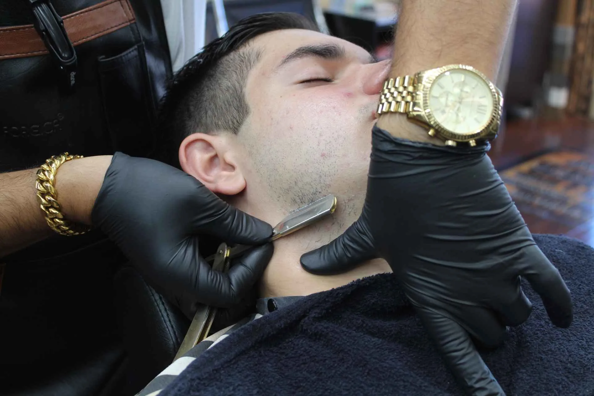Straight razor shave in progress